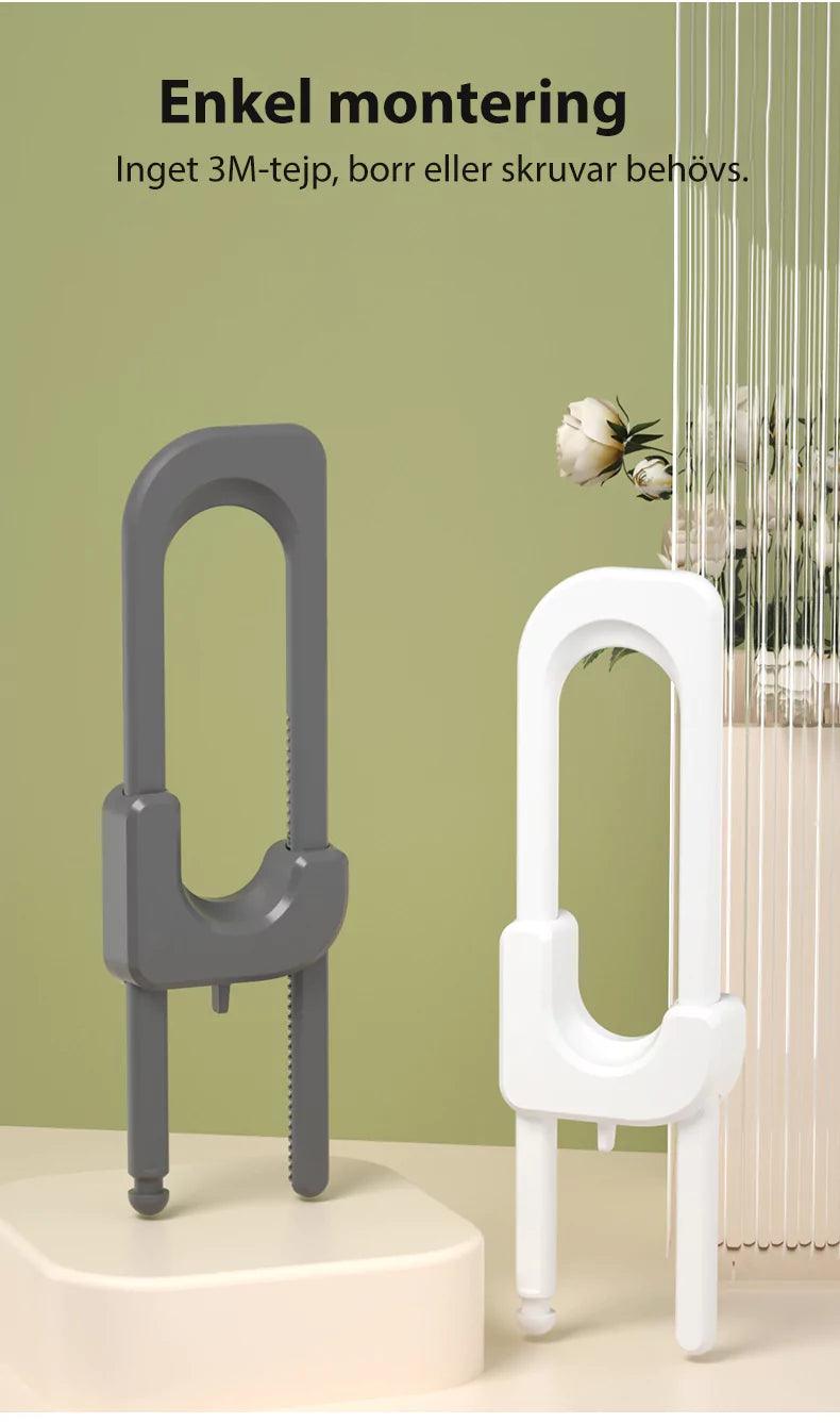 Grått och vitt barnlås för dubbeldörr med handtag, enkelt att montera utan borrning eller tejp