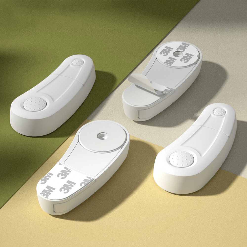 Vita barnlås för skåp med dubbeldörr, visade med 3M-tejp för enkel montering utan borrning.