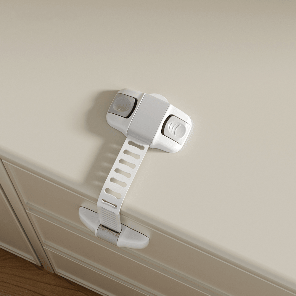 Justerbart barnlås med dubbelsidiga knappar monterat på skåp – säker spärr för barnsäkert hem.