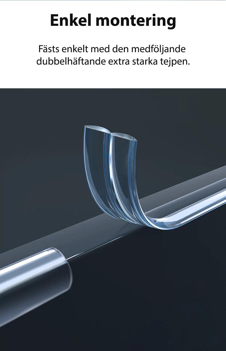 Transparent kantskydd böjs upp under montering på en bordskant, visat under rubriken Enkel montering.