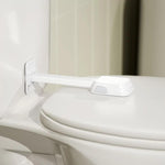 Toalettlås för barnsäkerhet – stabil spärr som håller toalettlocket stängt från nyfikna barn.