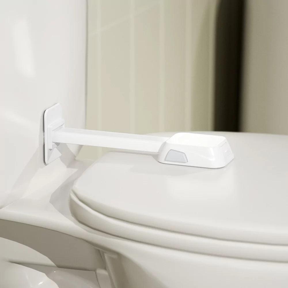 Toalettlås för barnsäkerhet – stabil spärr som håller toalettlocket stängt från nyfikna barn.