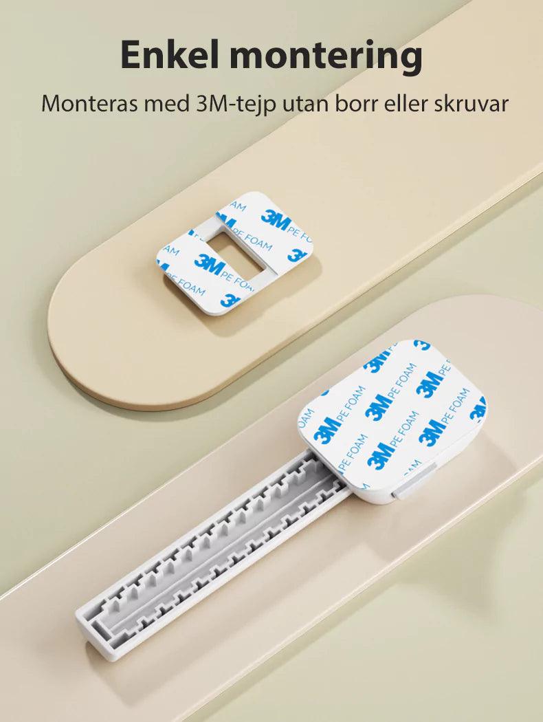 Enkel montering av barnsäkert toalettlås med stark 3M-tejp utan behov av borr eller skruvar.