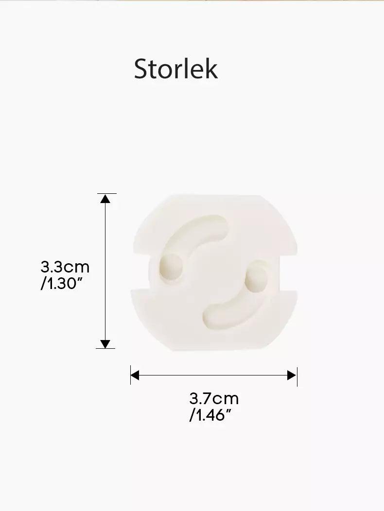 Vridbart petskydd till eluttag visat framifrån med måttmarkeringar: 3,3 cm i höjd och 3,7 cm i bredd